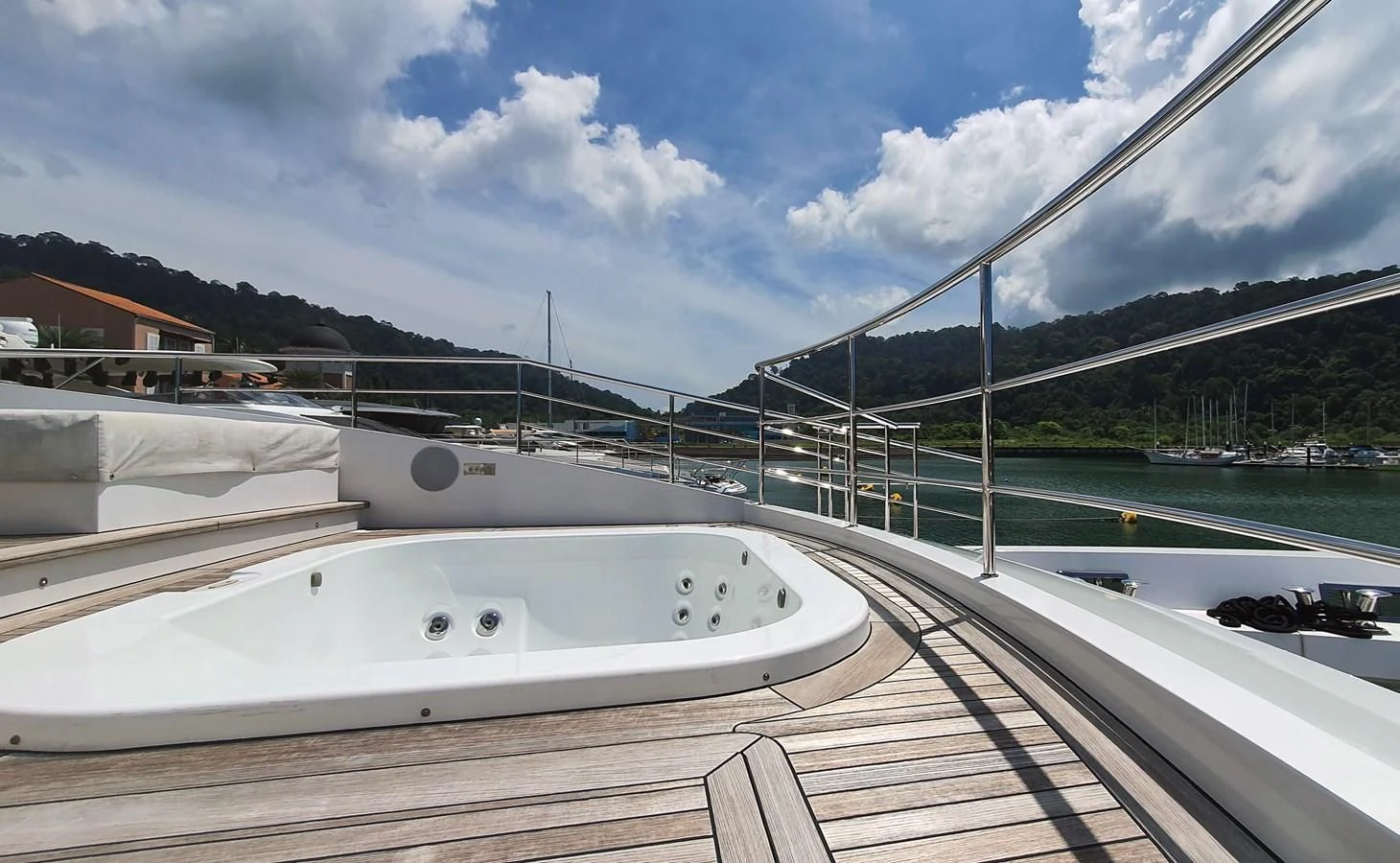 a large white boat on a dock aboard CALYPSO Yacht for Charter