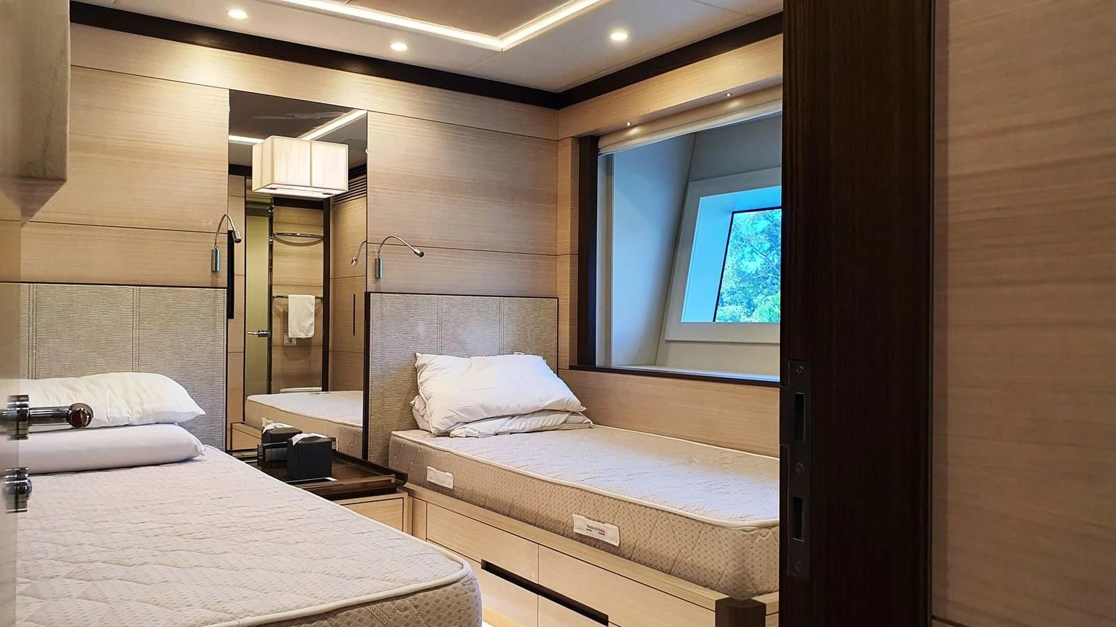 a room with two beds aboard CALYPSO Yacht for Charter