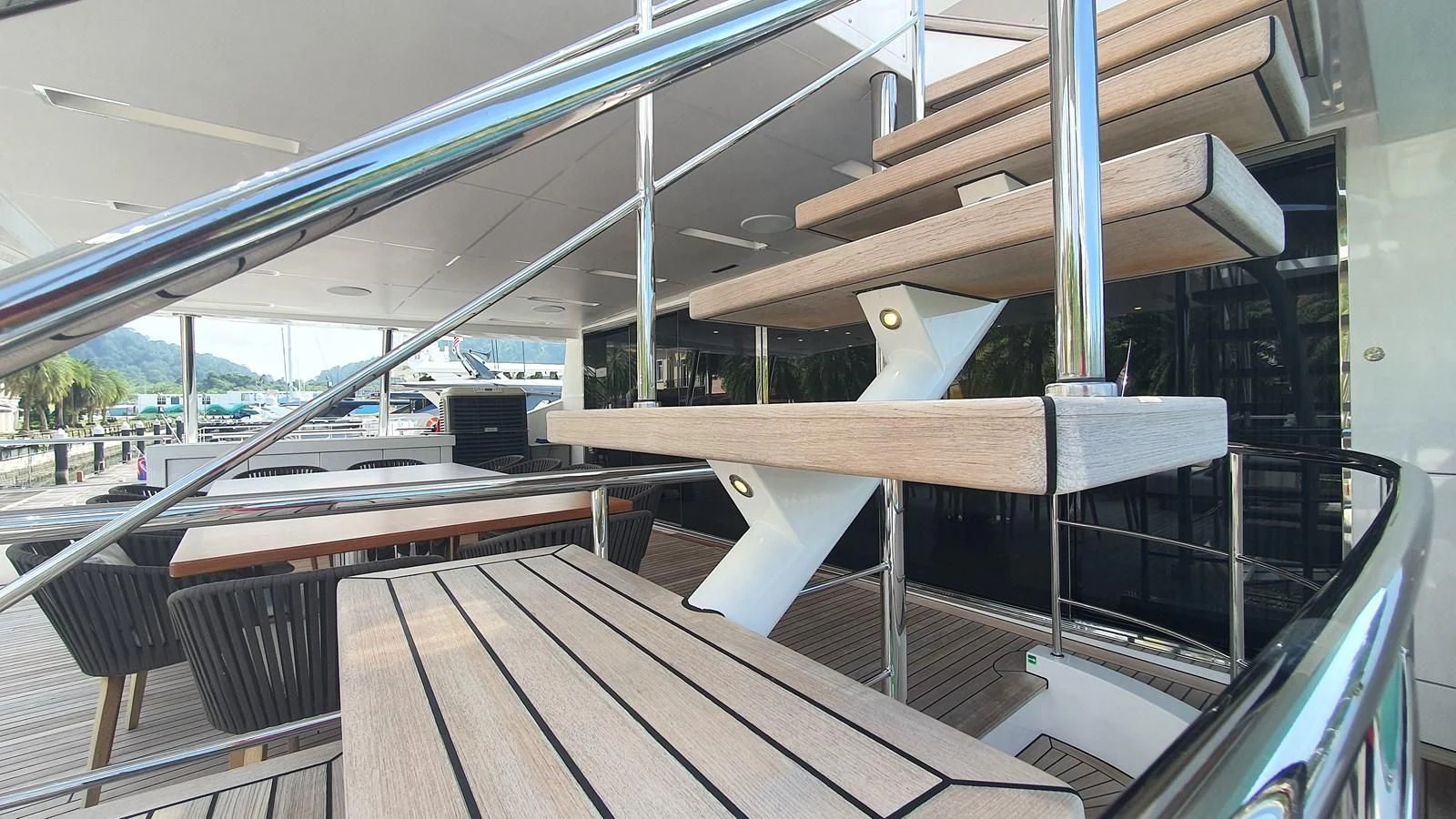 a wood deck with a large white object on it aboard CALYPSO Yacht for Charter