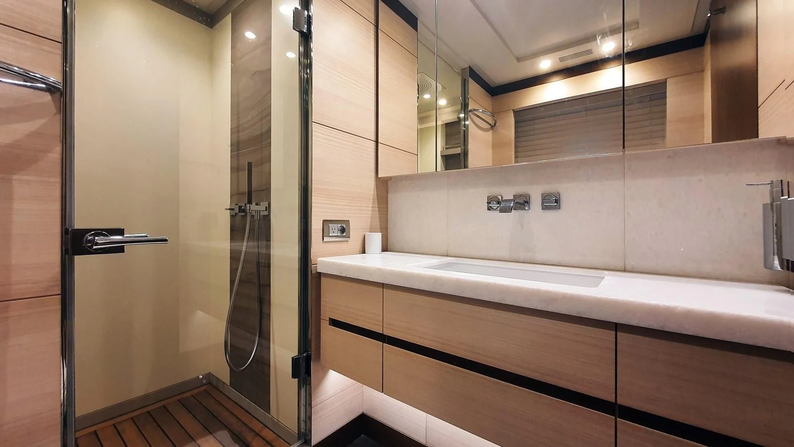 a bathroom with a bathtub and shower aboard CALYPSO Yacht for Charter