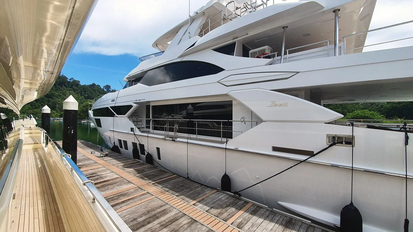 a white yacht docked aboard CALYPSO Yacht for Charter