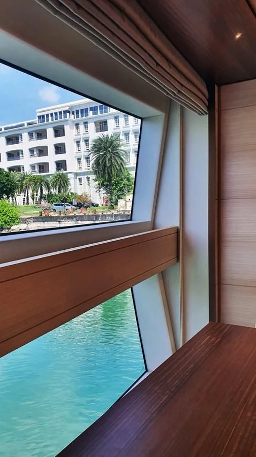 a pool with a building in the background aboard CALYPSO Yacht for Charter