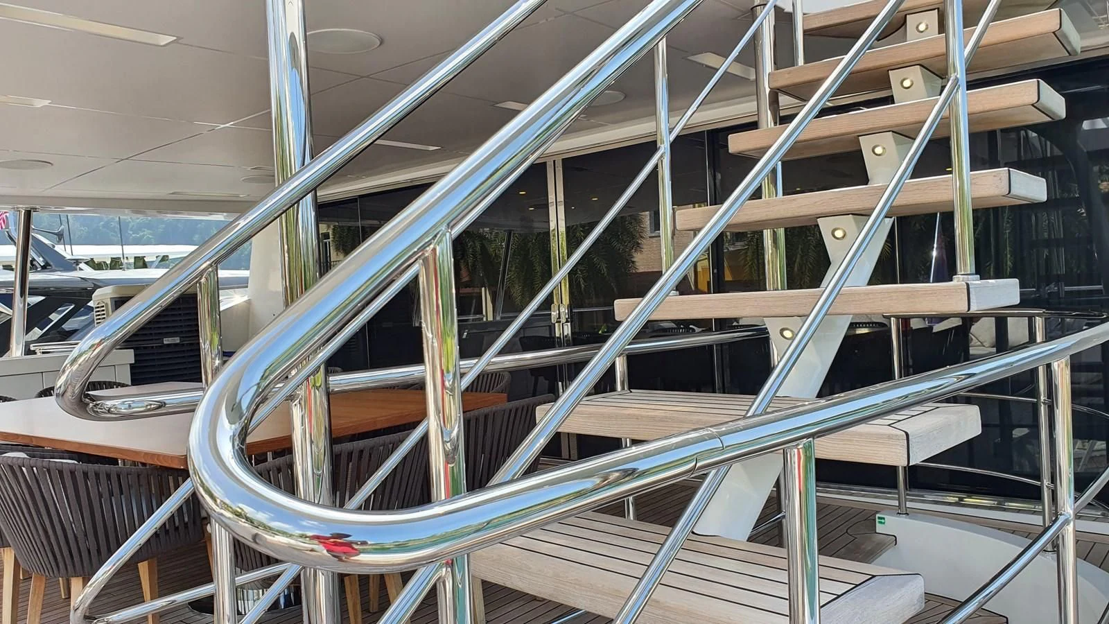 a staircase with metal railings aboard CALYPSO Yacht for Charter