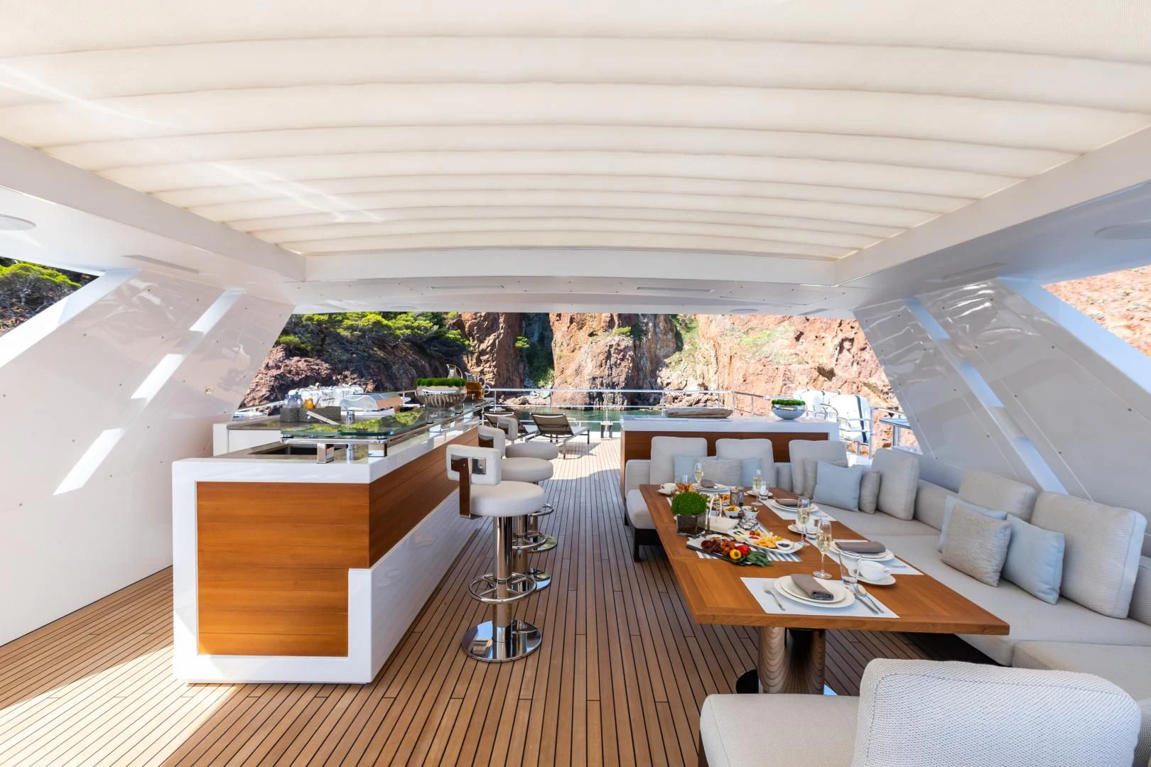 a room with a table and chairs aboard CALYPSO Yacht for Charter