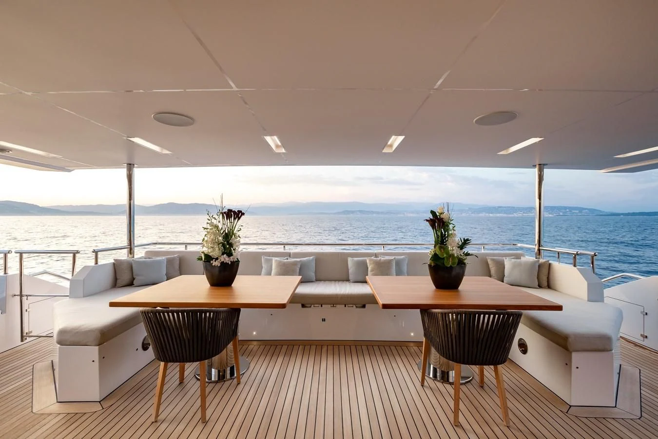 a room with a table and chairs aboard CALYPSO Yacht for Charter