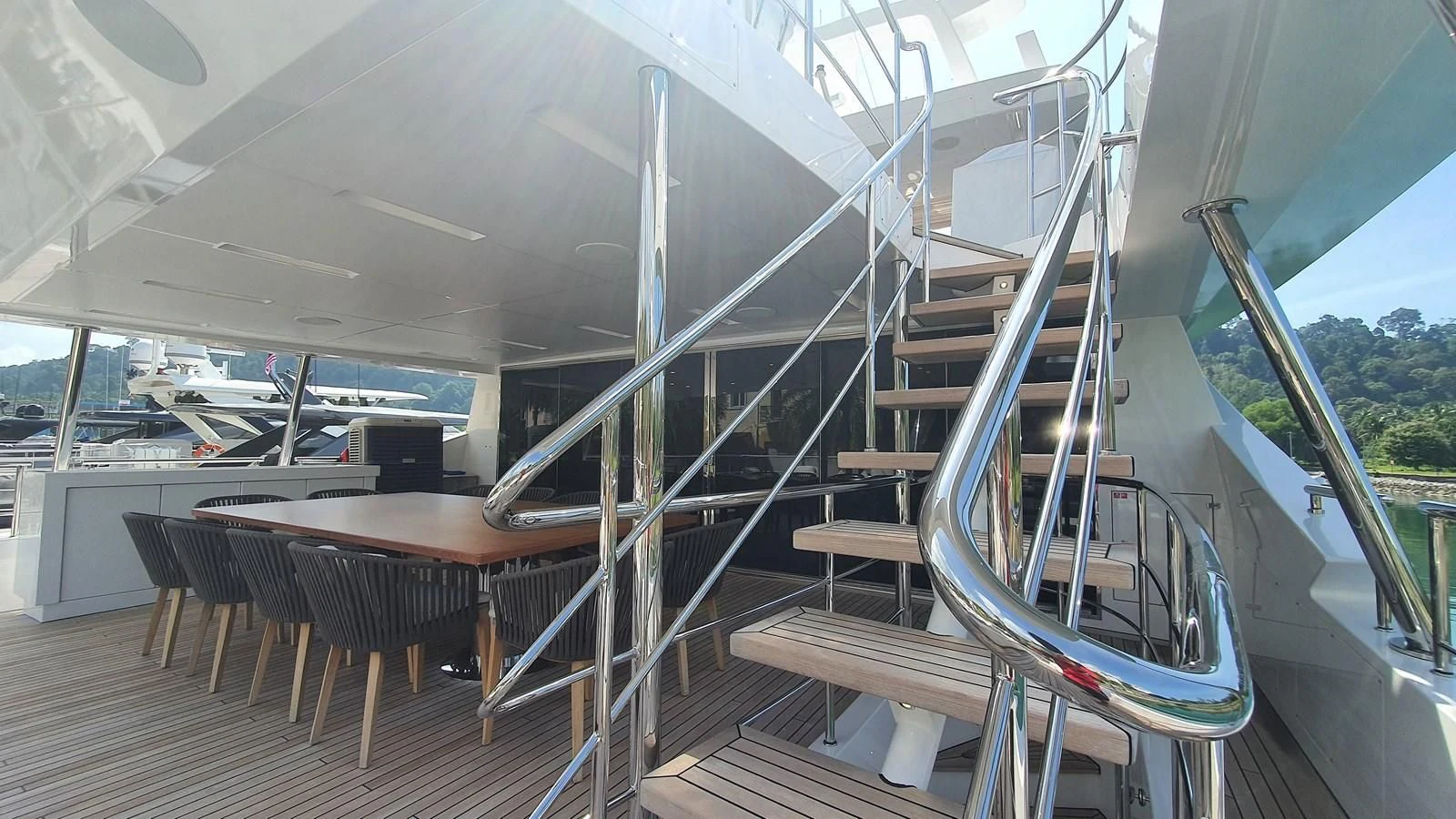 a staircase with a glass window aboard CALYPSO Yacht for Charter