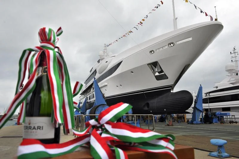 a large white ship docked aboard SURPINA Yacht for Sale