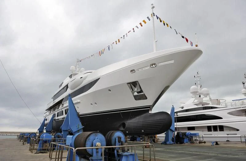 a large boat docked at a pier aboard SURPINA Yacht for Sale