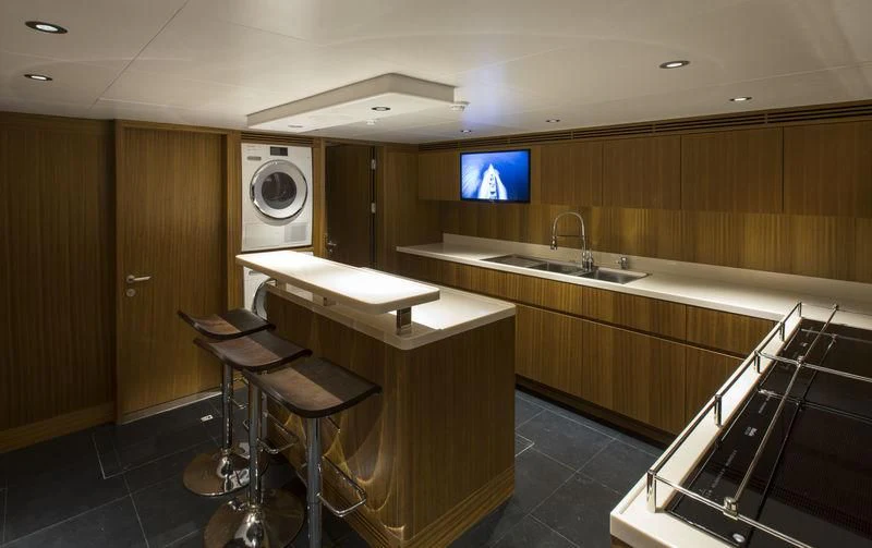 a room with a desk and a tv aboard C'EST LA VIE Yacht for Sale