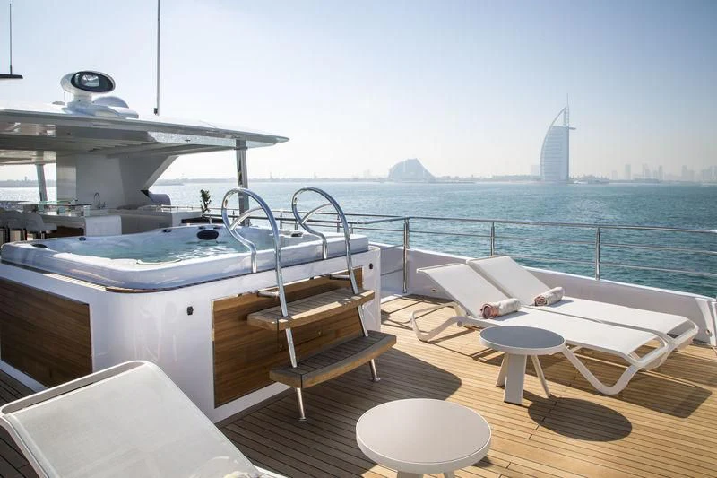 a boat on a deck aboard C'EST LA VIE Yacht for Sale