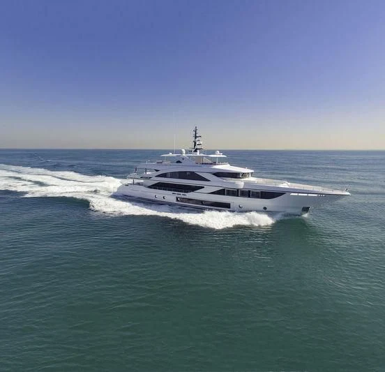 a white boat on the water aboard C'EST LA VIE Yacht for Sale