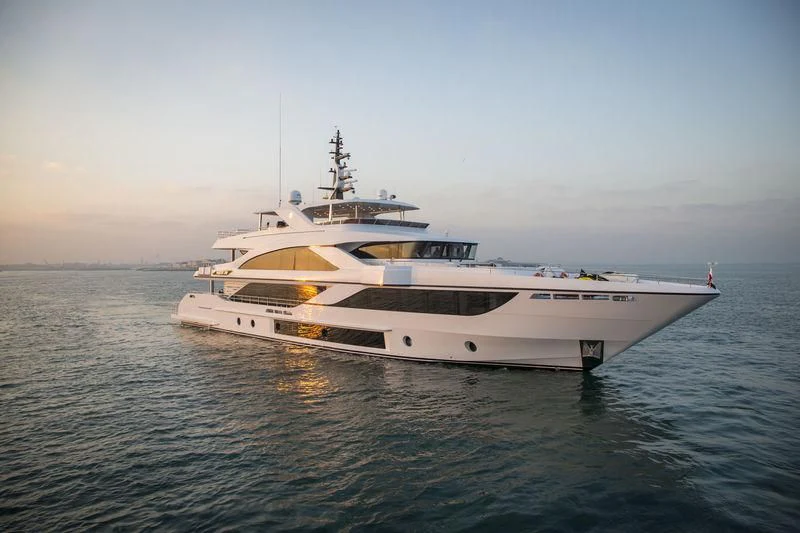 a white yacht in the water aboard C'EST LA VIE Yacht for Sale