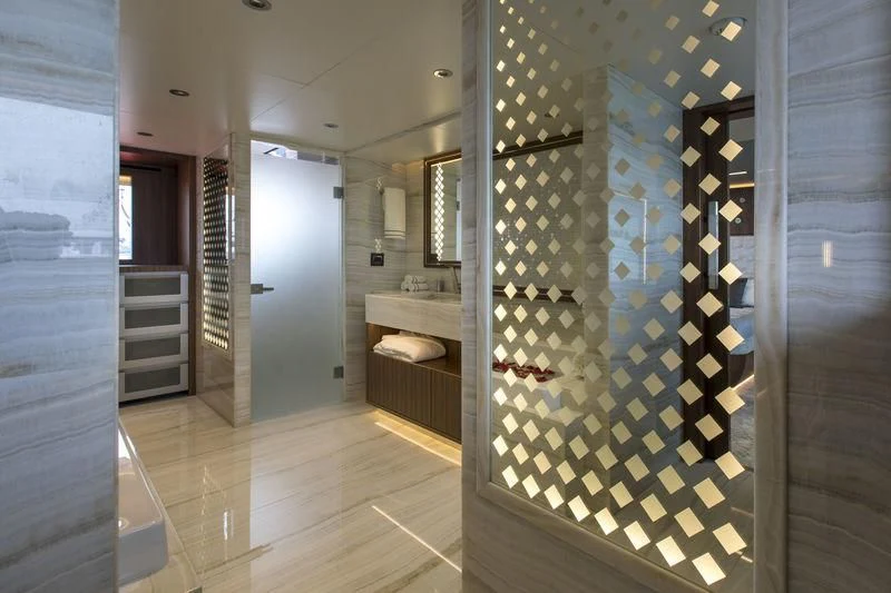 a bathroom with a shower aboard C'EST LA VIE Yacht for Sale
