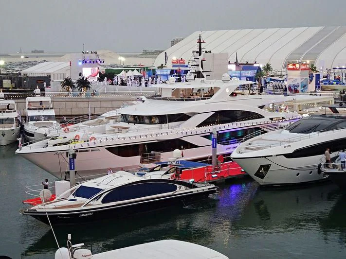 a group of boats are parked in a harbor aboard C'EST LA VIE Yacht for Sale