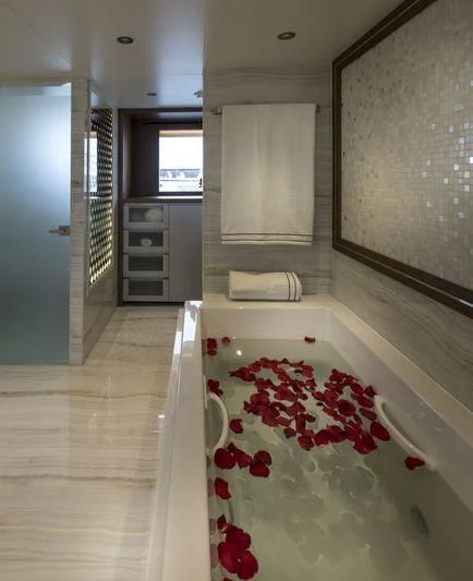 a hallway with a tile floor and a tile floor aboard C'EST LA VIE Yacht for Sale