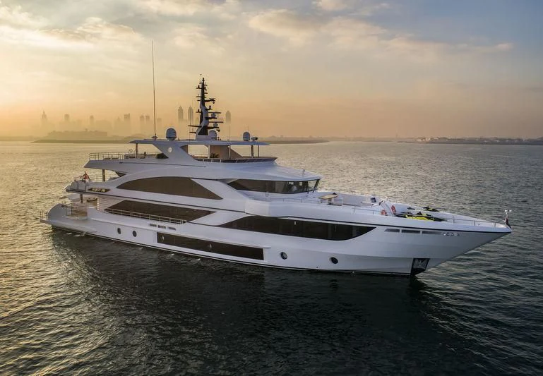 a white yacht in the water aboard C'EST LA VIE Yacht for Sale