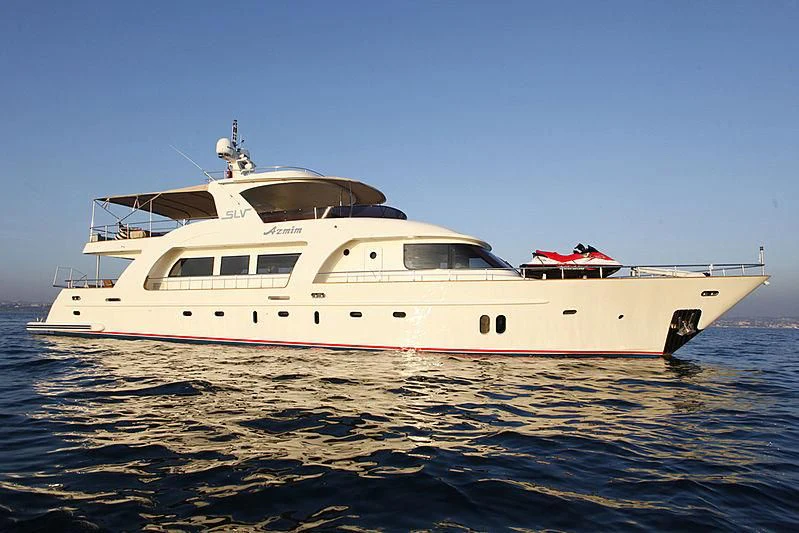 a large white boat in the water aboard AZMIM Yacht for Sale