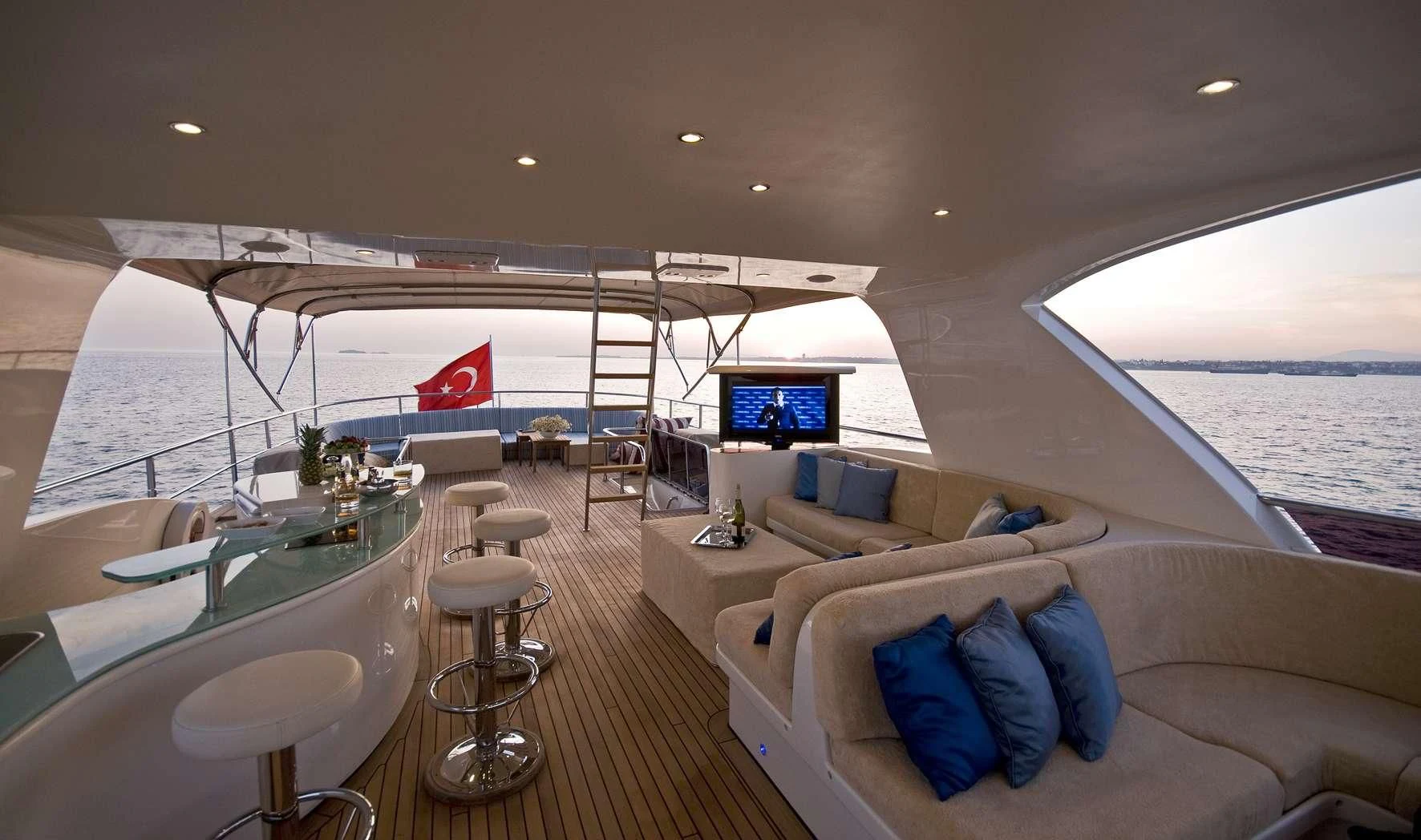 a living room with a large window aboard AZMIM Yacht for Sale