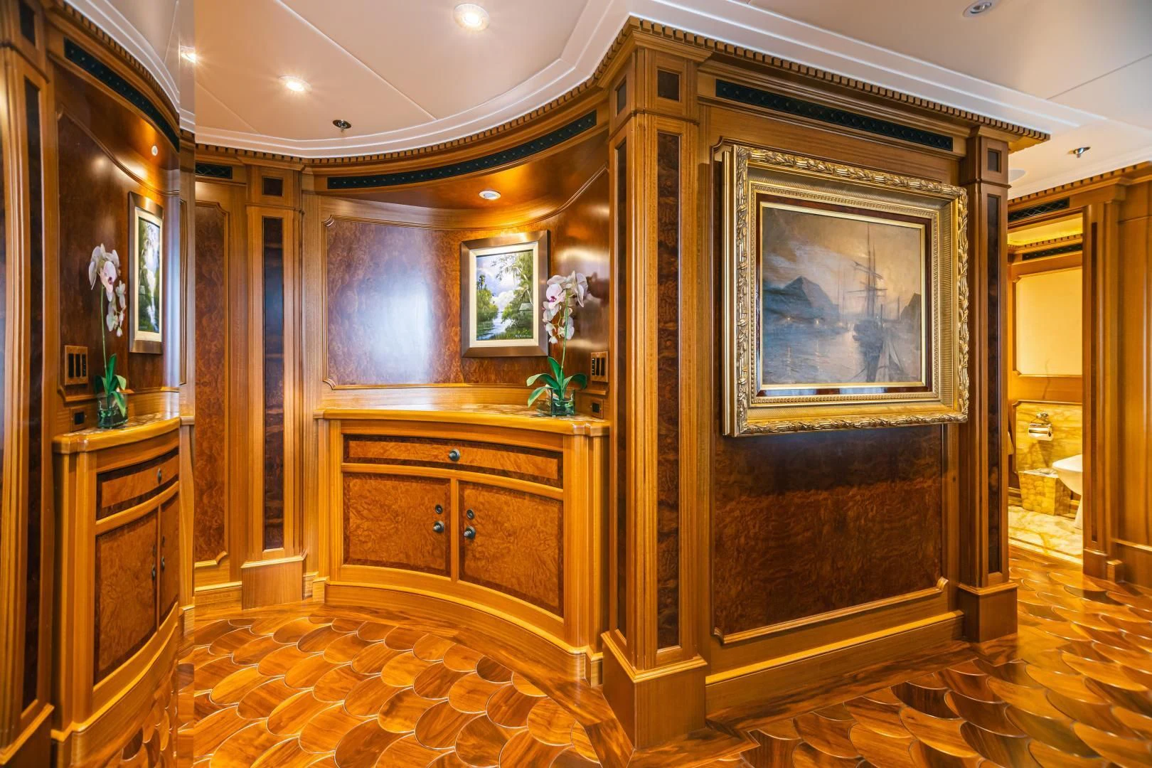 a room with a large mirror aboard ACTA Yacht for Charter