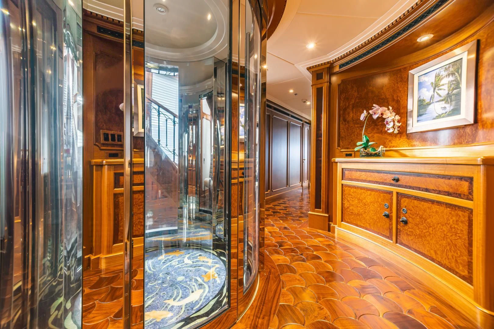 a room with a glass door aboard ACTA Yacht for Charter