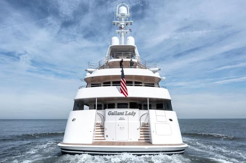 a large white boat in the water aboard ACTA Yacht for Charter