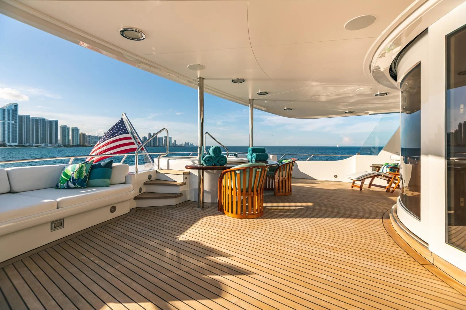 a deck with a flag on it aboard ACTA Yacht for Charter