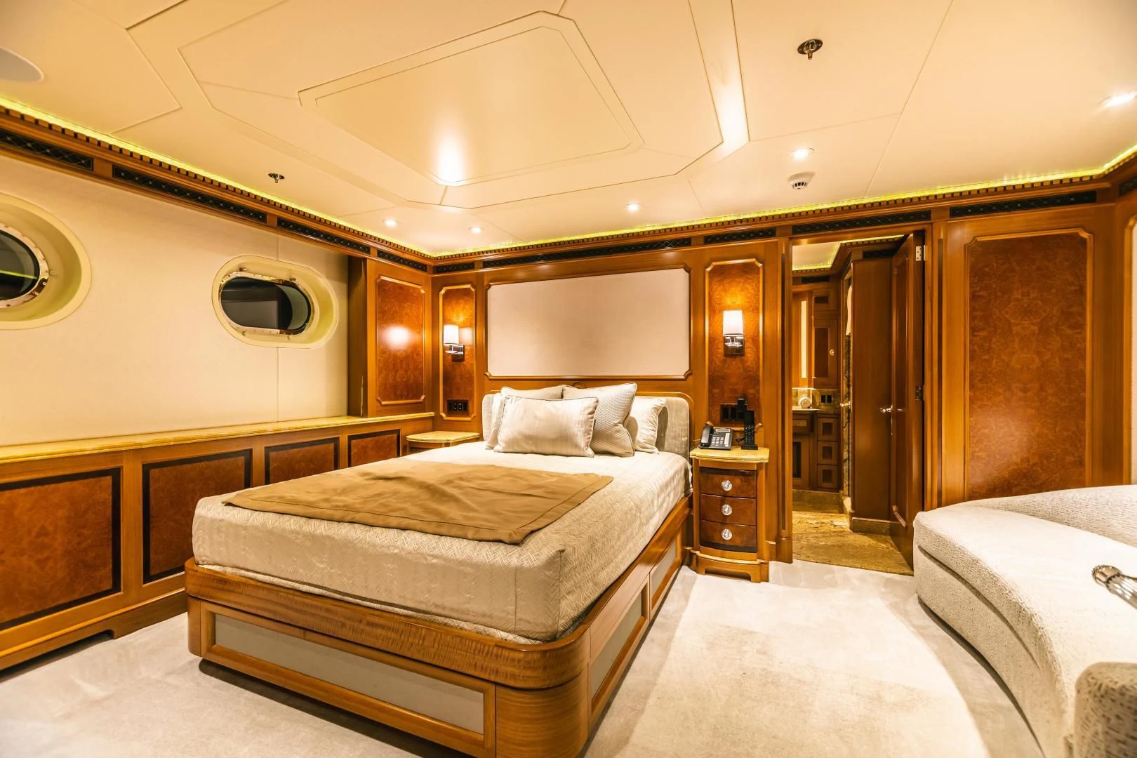 a hotel room with a bed aboard ACTA Yacht for Charter