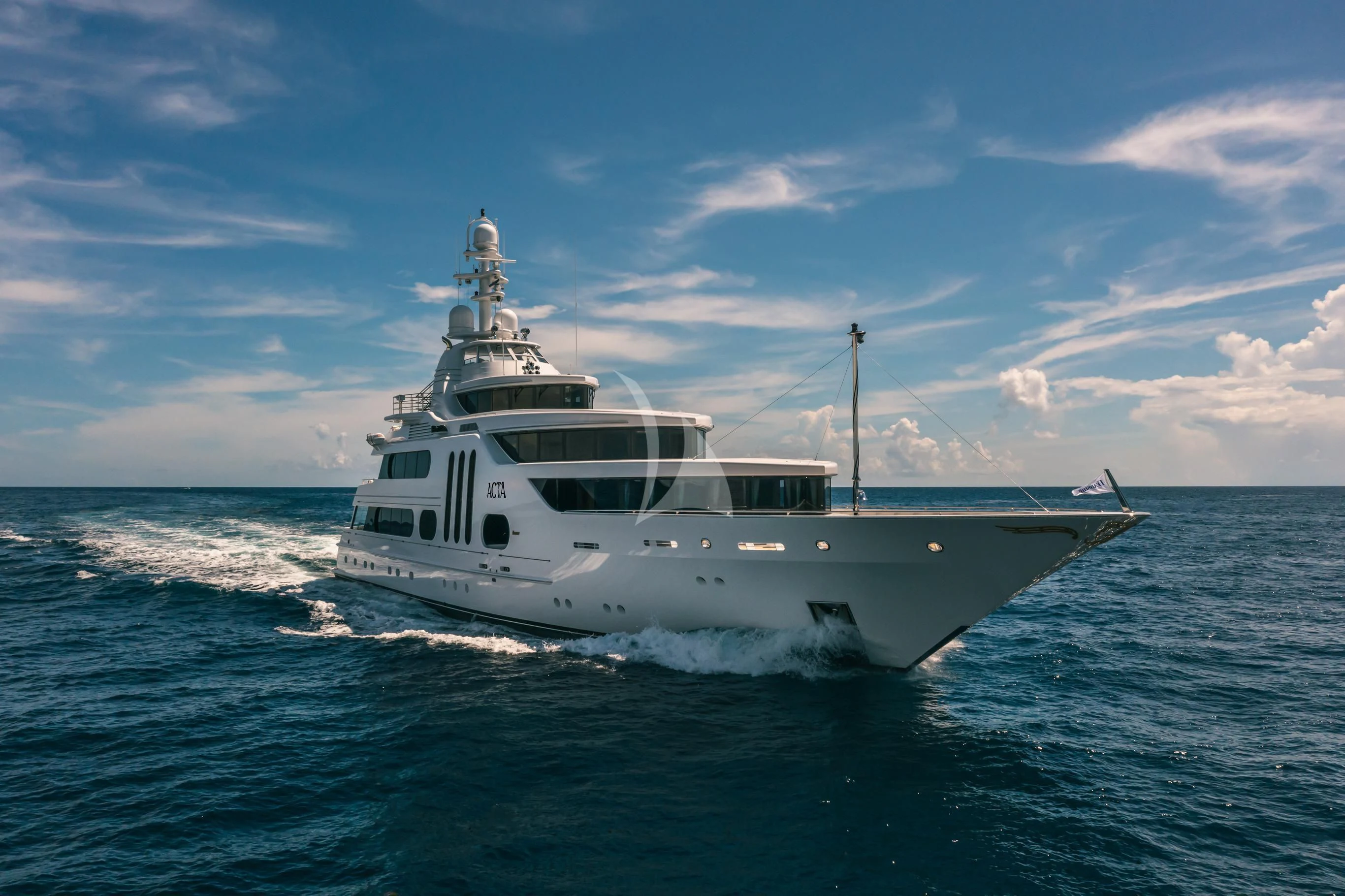 a white yacht on the water aboard ACTA Yacht for Charter
