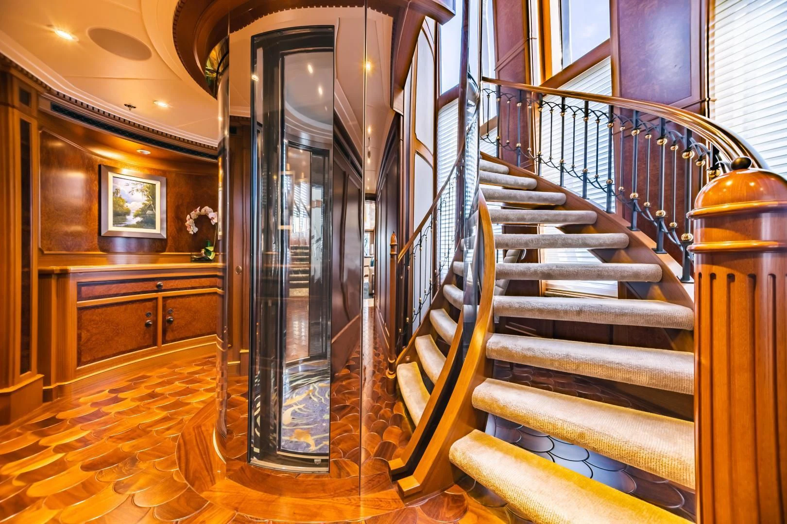 a large room with a glass door aboard ACTA Yacht for Charter