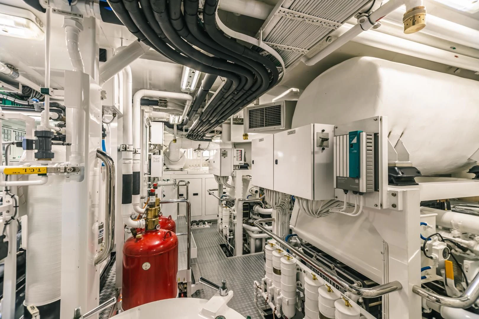 a room with machinery aboard ACTA Yacht for Charter