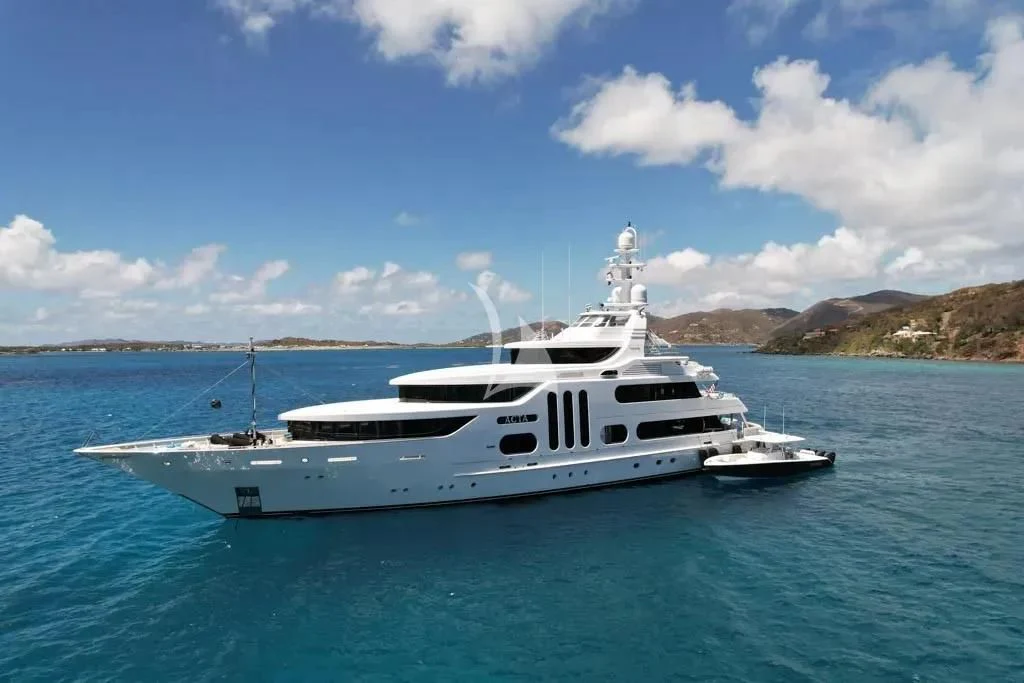 a white yacht in the water aboard ACTA Yacht for Charter