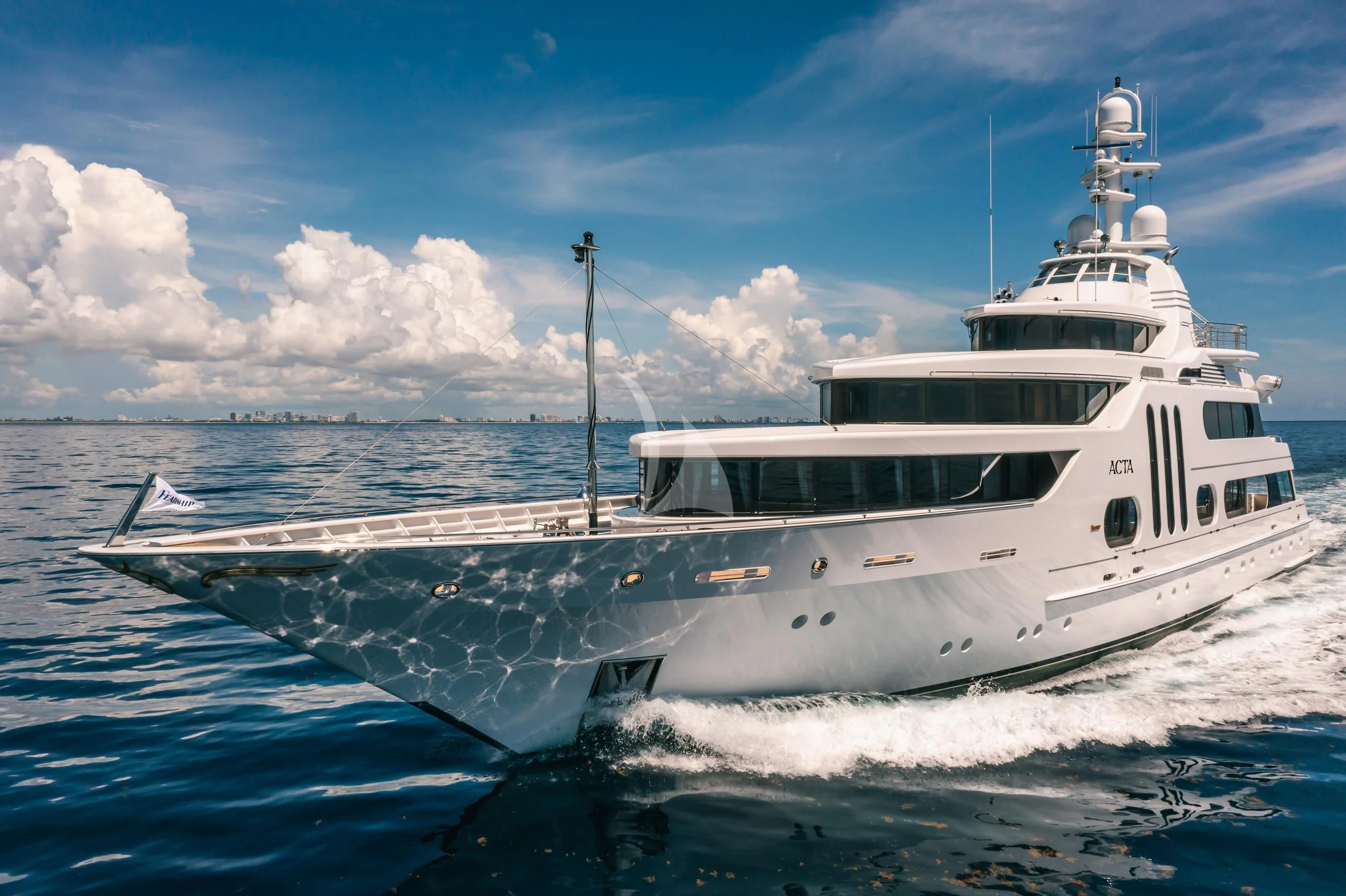 a large white boat aboard ACTA Yacht for Charter