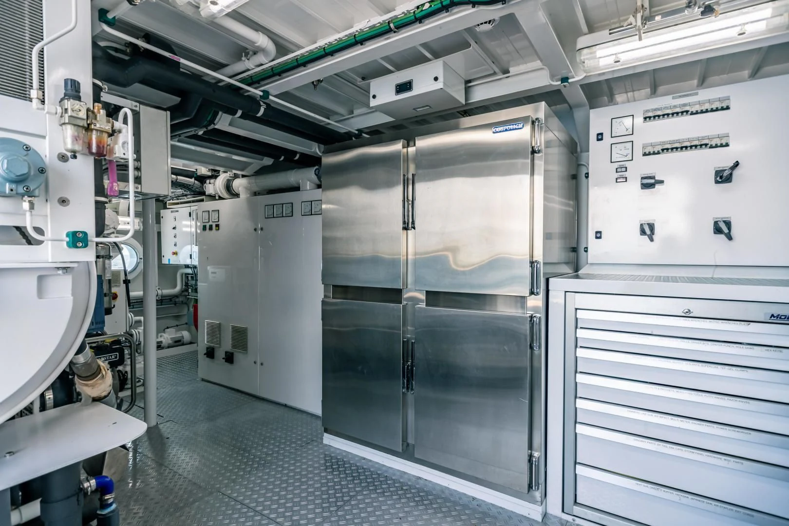 a room with machines aboard ACTA Yacht for Charter