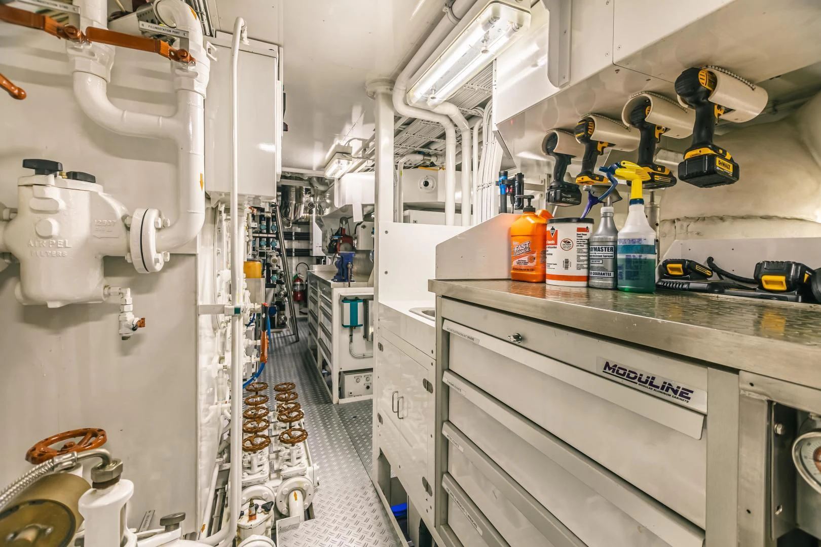 a room with machinery and equipment aboard ACTA Yacht for Charter