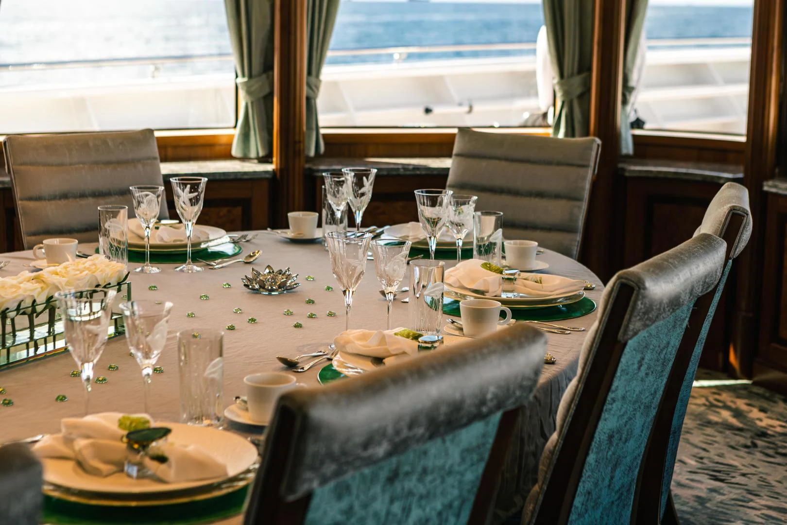 a table set for a dinner aboard ACTA Yacht for Charter