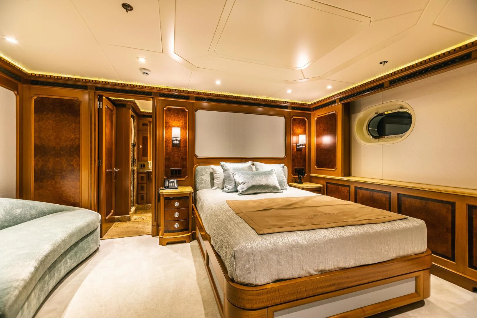 a hotel room with a bed aboard ACTA Yacht for Charter
