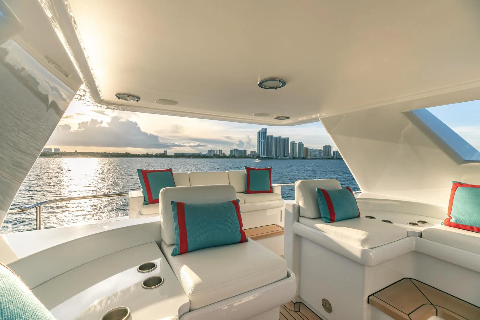 a room with a view of the ocean and the city aboard ACTA Yacht for Charter