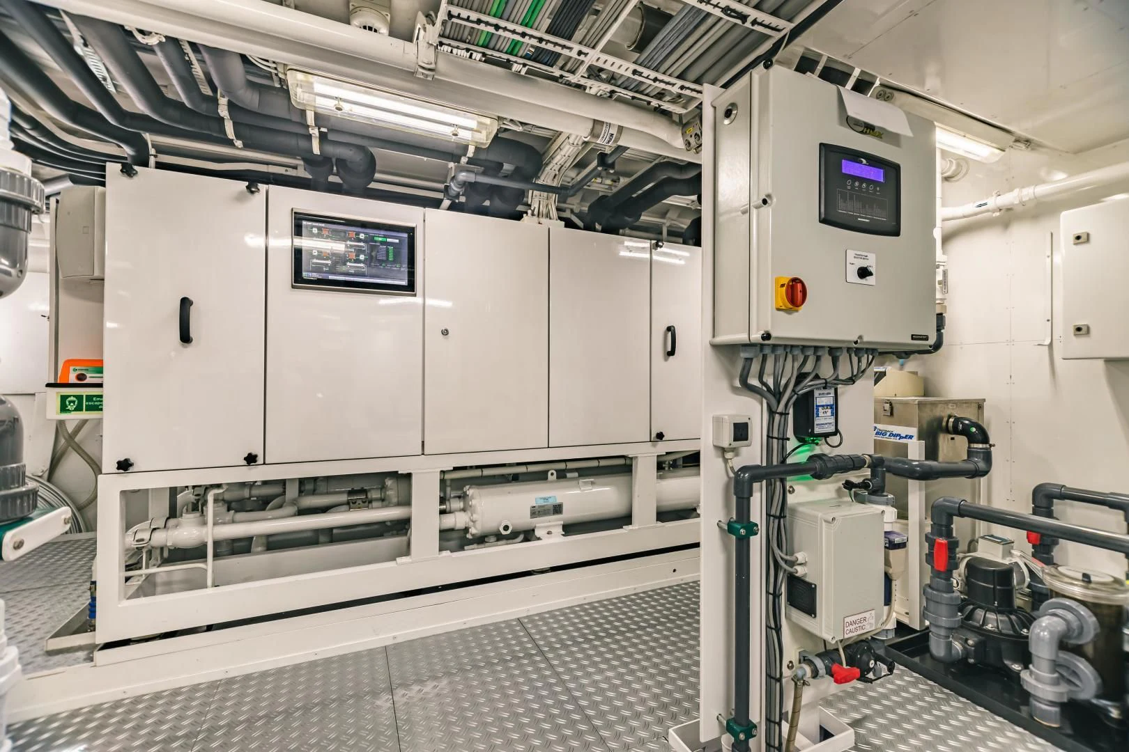 a large room with machines aboard ACTA Yacht for Charter