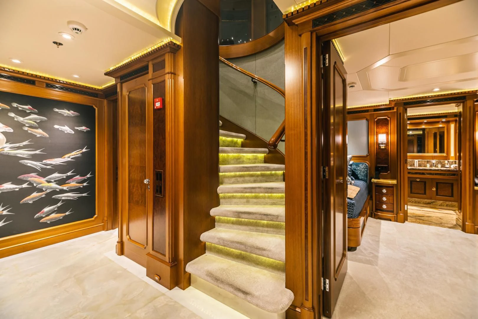 a hallway with doors and windows aboard ACTA Yacht for Charter