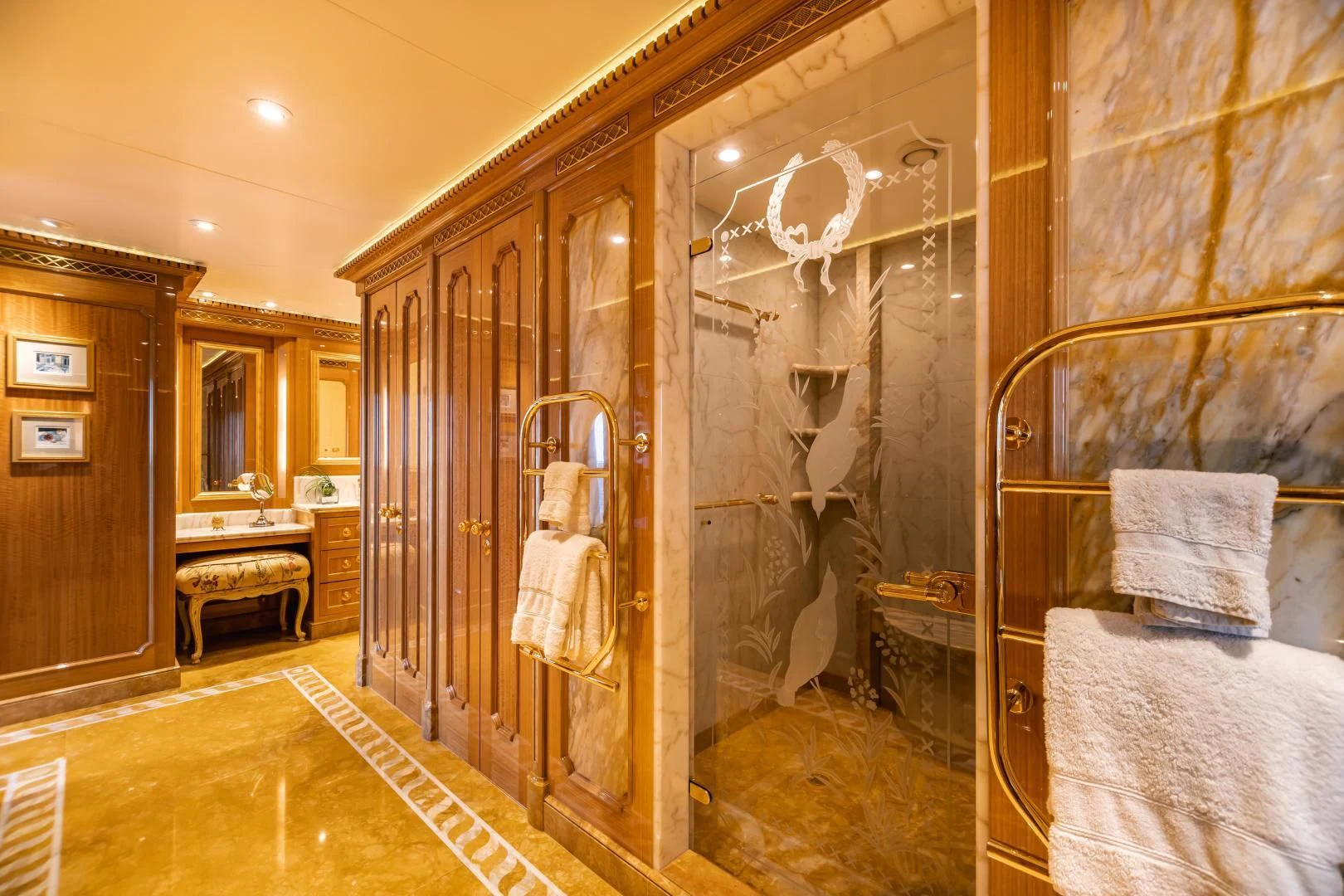 a bathroom with a shower and a sink aboard ACTA Yacht for Charter