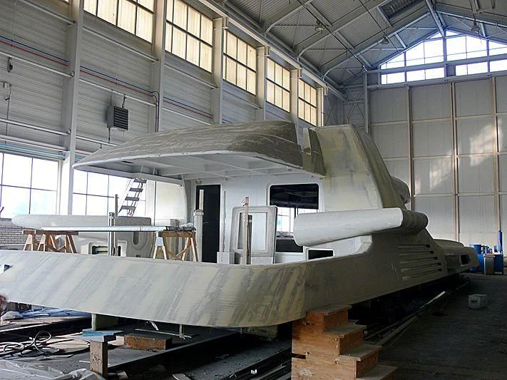 a large machine in a factory aboard ACTA Yacht for Charter