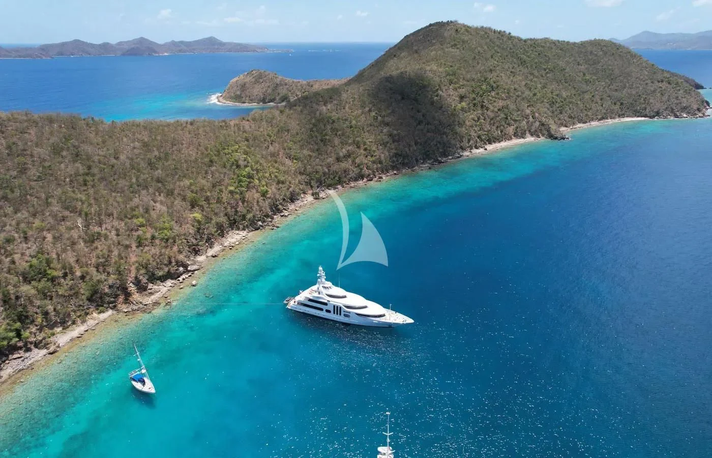 a group of boats on a body of water aboard ACTA Yacht for Charter
