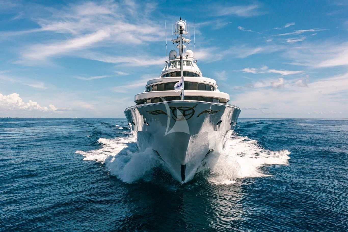 a large white boat in the water aboard ACTA Yacht for Charter
