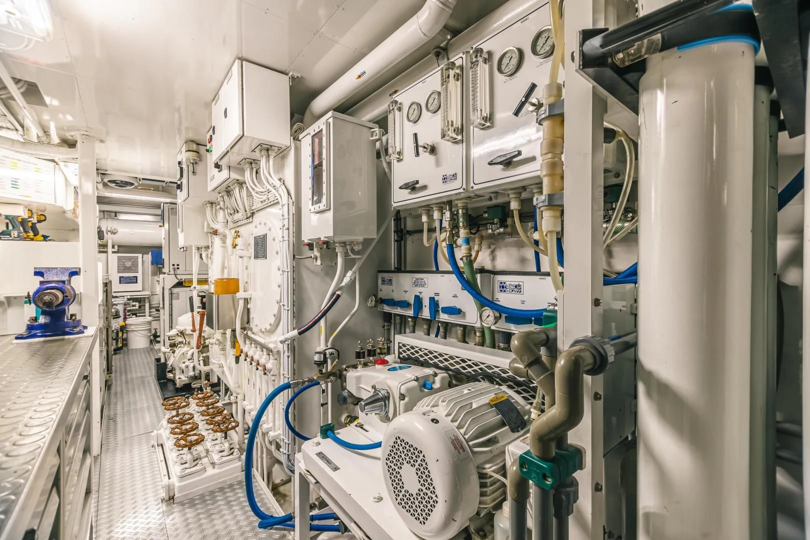 a room with machinery aboard ACTA Yacht for Charter