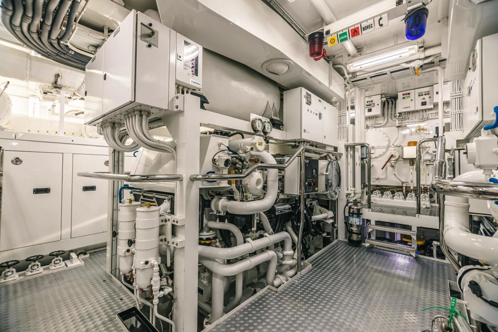 a room with machinery aboard ACTA Yacht for Charter