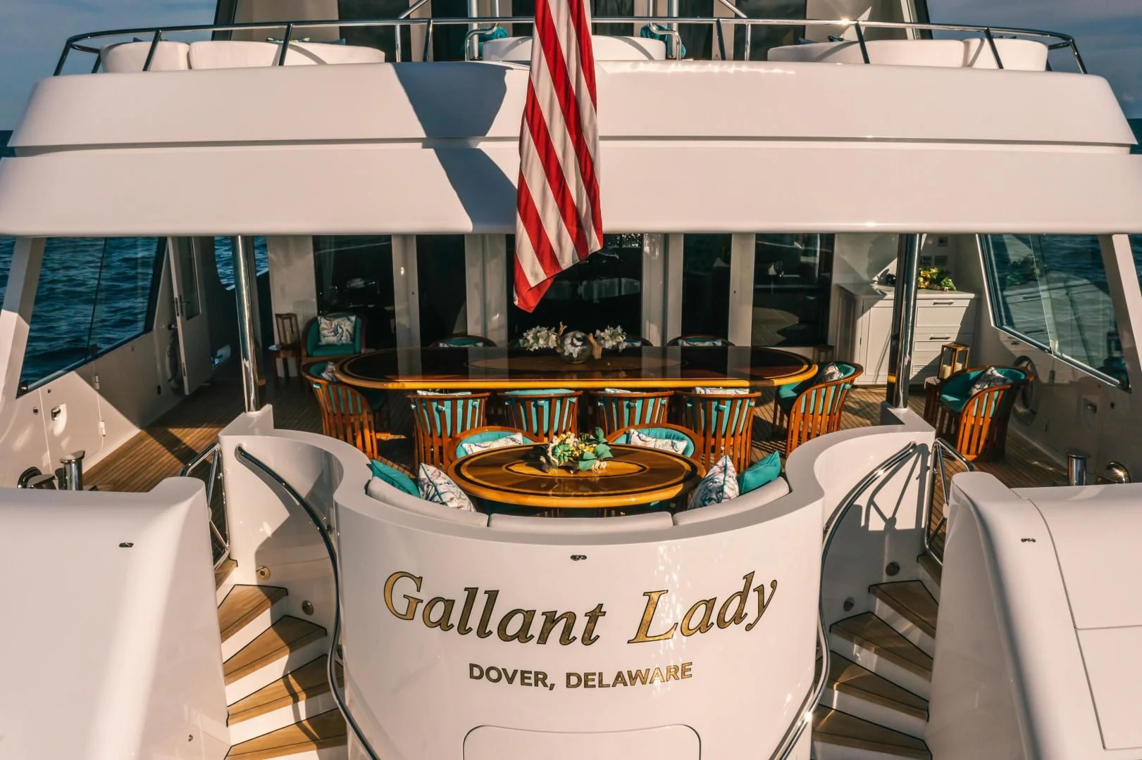 a table with a sign on it aboard ACTA Yacht for Charter