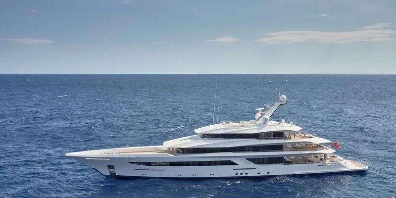 a white yacht in the ocean aboard JOY Yacht for Sale
