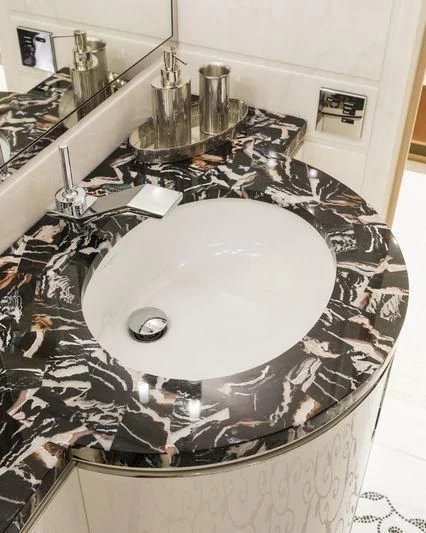 a record player on a table aboard JOY Yacht for Sale