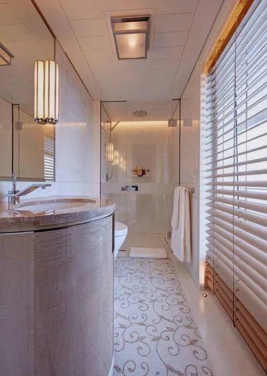 a bathroom with a sink and a shower aboard JOY Yacht for Sale