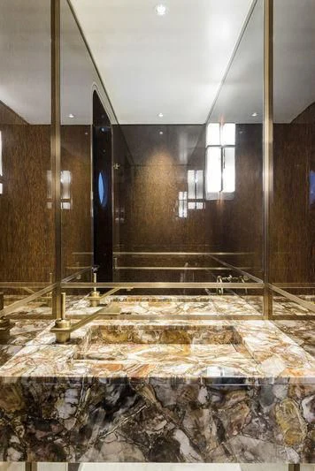 a room with a broken wall aboard JOY Yacht for Sale